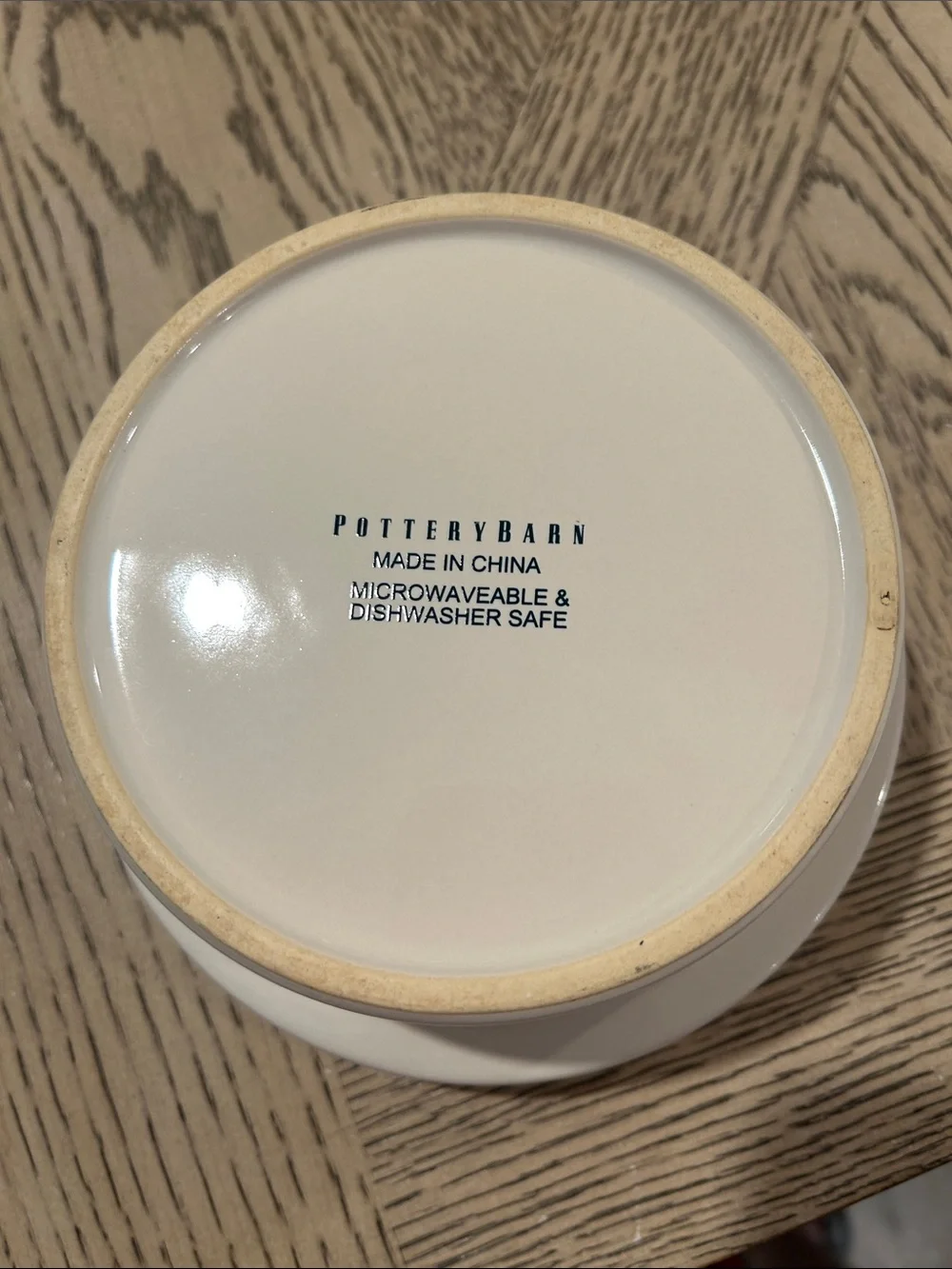 Pottery Barn Cream Ceramic dog bowl with Blue Logo
